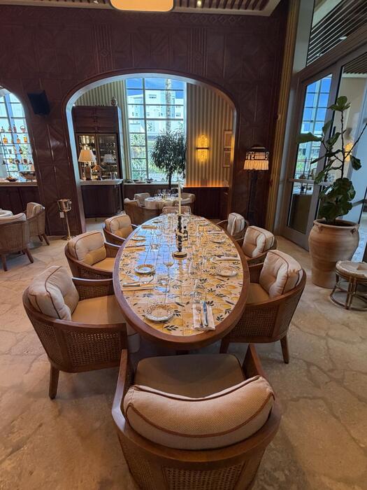 Arched terrace dining set for service in the evening