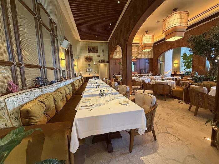 Evening restaurant terrace with lantern-style pendant lighting